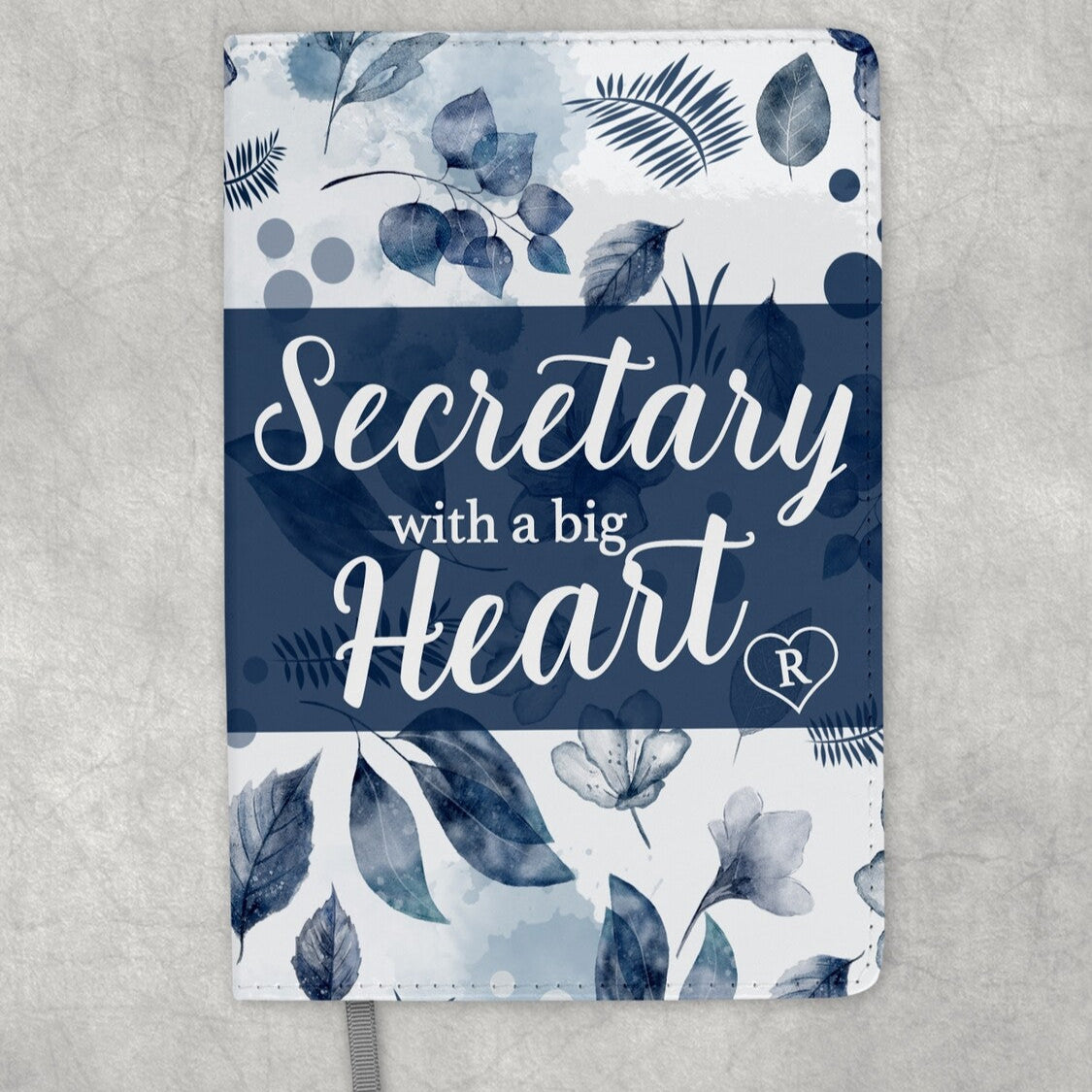 Personalised Notebook from Happy Look | South Africa – A beautiful design featuring blue leaves with the phrase "Secretary with a big Heart." Perfect for everyday use and customisable with names or messages. A thoughtful gift that brings joy and lasting memories. Shop now!