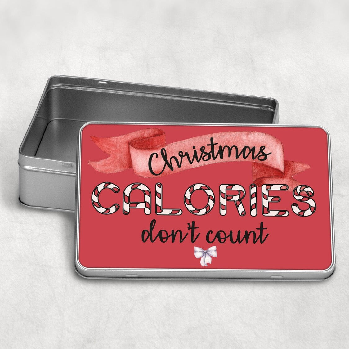 Personalised Metal Gift Box from Happy Look | South Africa – Customisable metal tin with a festive 'Chirstmas CALORIES don't count' design, featuring a candy cane design with a bow. Perfect for Christmas, birthdays, and special occasions. A thoughtful keepsake for lasting memories. Shop now!