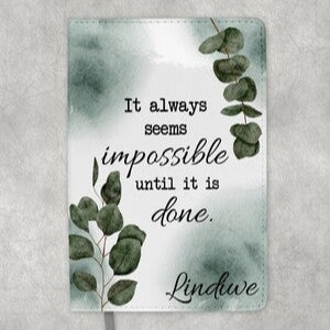 Personalised Notebook from Happy Look | South Africa – A calming design featuring green leaves and the quote "It always seems impossible until it is done." Perfect for inspiration and customisable with names. A thoughtful gift that brings joy and lasting memories. Shop now!