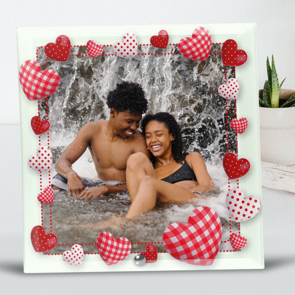 Personalised Glass Tile from Happy Look | South Africa – Featuring a joyful moment of a couple enjoying water play, adorned with a decorative heart border. Perfect for romantic occasions and customisable with your choice of image and text. A thoughtful gift that brings joy and lasting memories. Shop now!