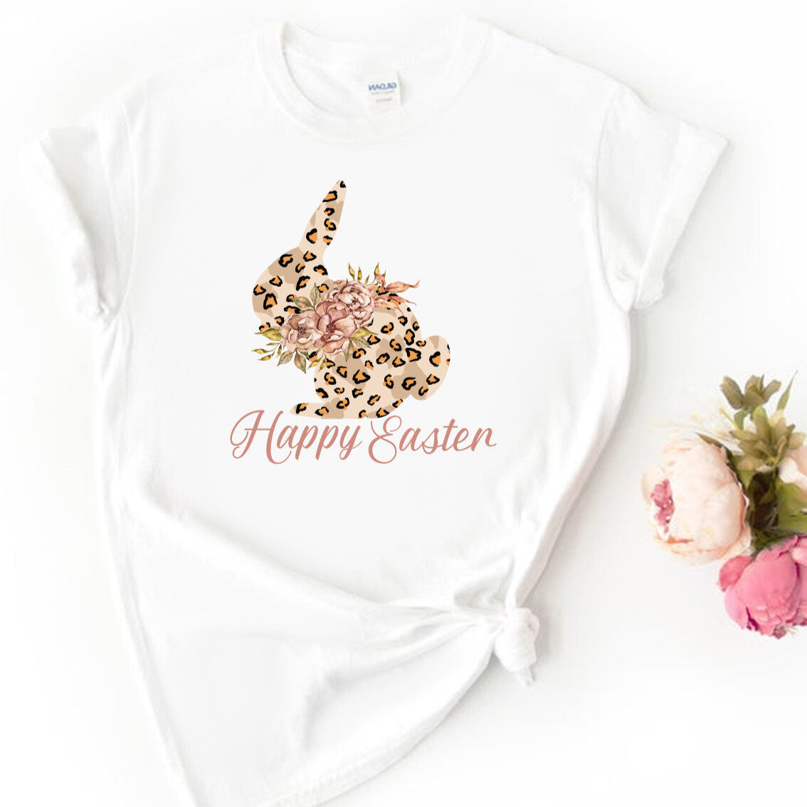Personalised Happy Easter Bunny T-Shirt from Happy Look | South Africa β Showcasing a playful bunny design with floral accents. Perfect for Easter festivities and customisable with your choice of name. A thoughtful gift that brings joy and lasting memories. Shop now!