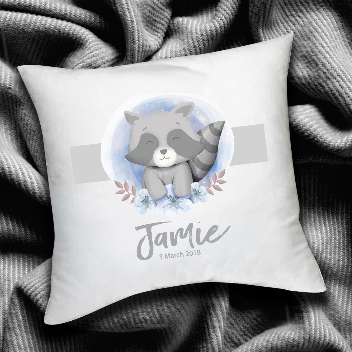 Personalised Pillow from Happy Look | South Africa – Adorned with a raccoon design and the name "Jamie" along with the date. Perfect for baby showers and customisable with names. A thoughtful gift that brings joy and lasting memories. Shop now!