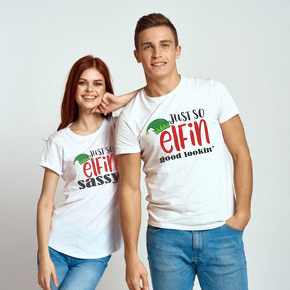 Matching Couple T-Shirts "Just So Elfin' Sassy" and "Just So Elfin' Good Lookin'" from Happy Look – White t-shirts printed with green elf hats and humorous red and black text: "JUST SO elfin sassy" for the woman and "JUST SO elfin good lookin'" for the man. Ideal for Christmas, holiday photos, or as a fun couple's gift.