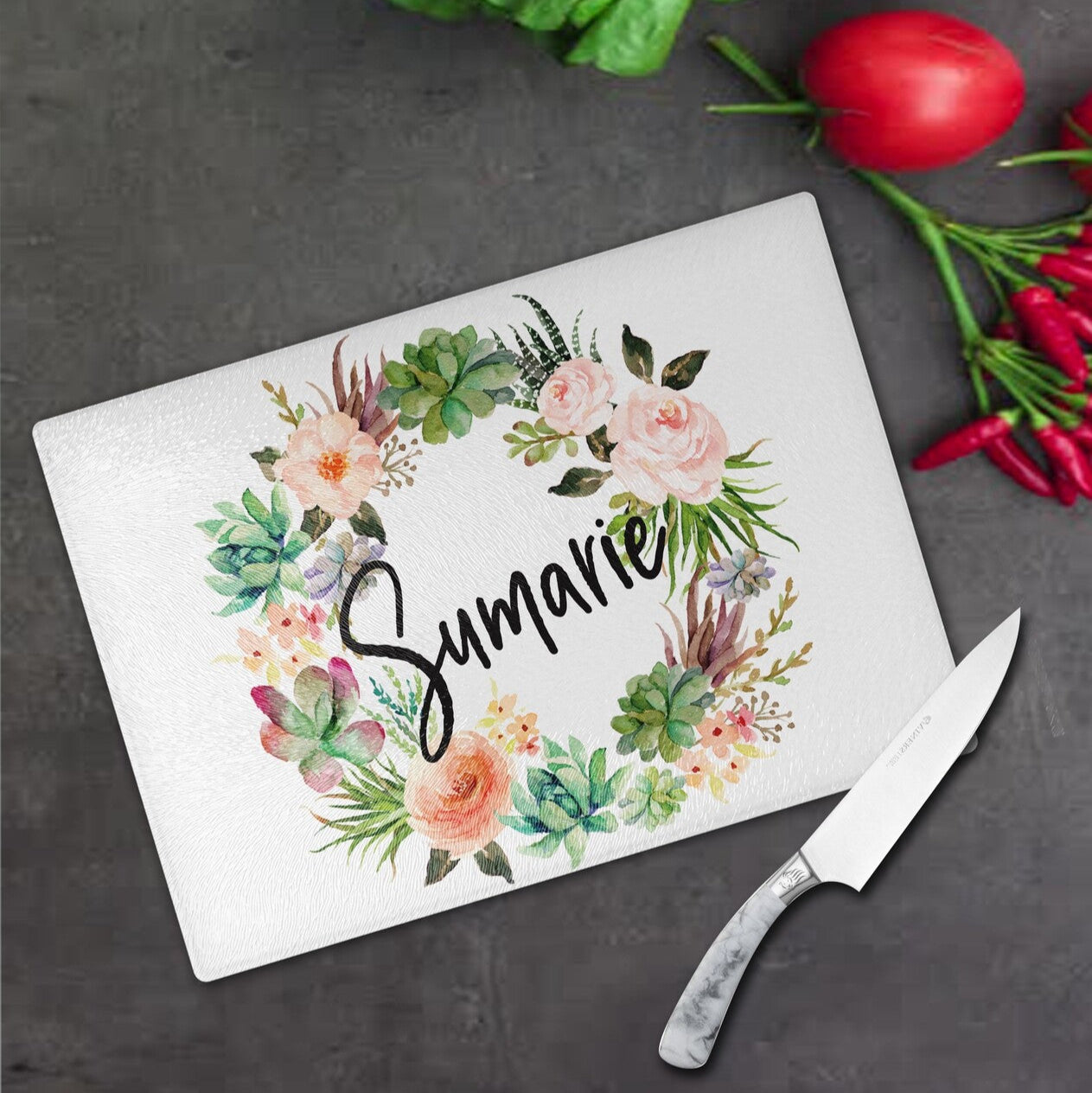 Personalised Glass Cutting Board from Happy Look | South Africa – Floral-decorated glass cutting board with the name "Sumarie" prominently displayed. Perfect for birthdays, weddings, or housewarmings and customisable with a name or special message. A thoughtful gift that brings joy and lasting memories. Shop now!