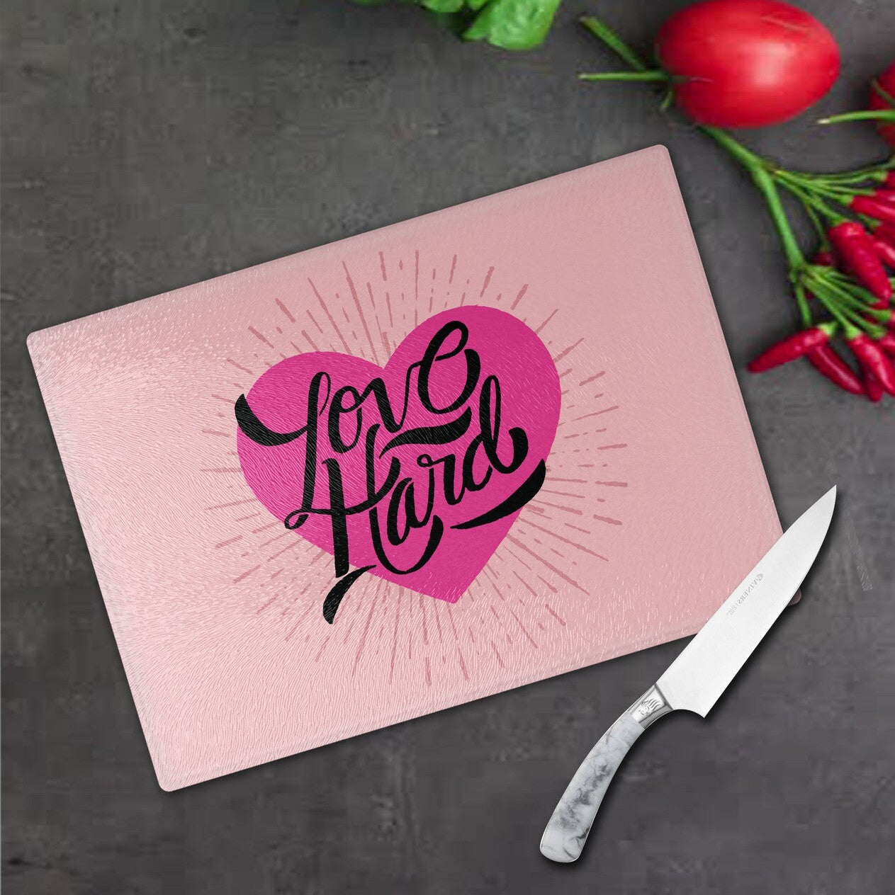 Personalised Glass Cutting Board from Happy Look | South Africa – A pink cutting board featuring the phrase "Love Hard" written in a stylish font. Perfect for Valentine's Day, anniversaries, or special occasions and customisable with a name or personal message. A thoughtful gift that brings joy and lasting memories. Shop now!