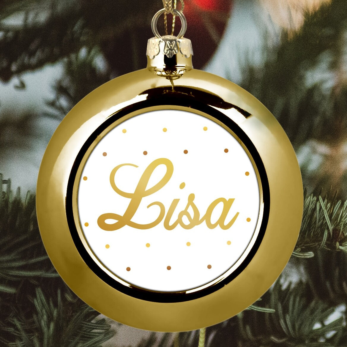 Custom Name Christmas Bauble "Lisa" (Gold) from Happy Look | South Africa – A glossy gold Christmas ornament hanging from a tree. The white center is framed by gold dots and features the name "Lisa" in large gold script. Perfect for individual personalization.