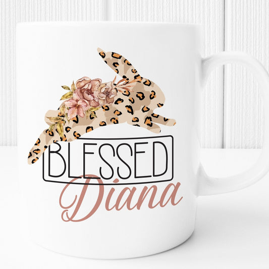 Personalised Mug from Happy Look | South Africa – Showcases a charming rabbit design with the name "Diana" and the word "Blessed." Perfect for Easter and customisable with names. A thoughtful gift that brings joy and lasting memories. Shop now!