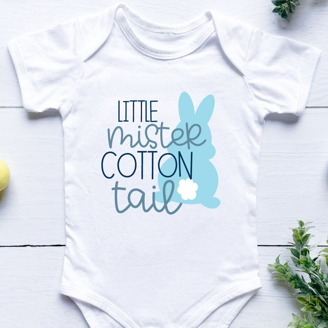 Personalised Little Mister Cotton Tail Onesie from Happy Look | South Africa – Showcases an adorable bunny silhouette with the phrase "Little Mister Cotton Tail." Perfect for Easter and customisable with names. A thoughtful gift that brings joy and lasting memories. Shop now!