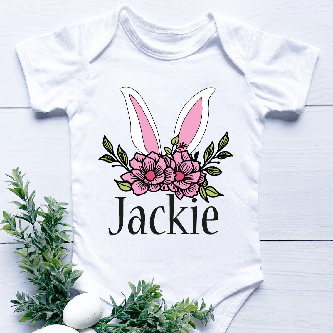 Personalised Jackie Onesie from Happy Look | South Africa – Includes a charming floral bunny design with the name "Jackie." Perfect for Easter and customisable with names. A thoughtful gift that brings joy and lasting memories. Shop now!