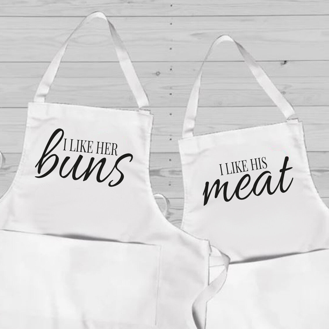  Personalised Couples Apron Set from Happy Look | South Africa – Fun and cheeky design with "I Like Her Buns" and "I Like His Meat." Perfect for Valentine's Day and date nights, customisable with names. A thoughtful gift that brings joy and lasting memories. Shop now!