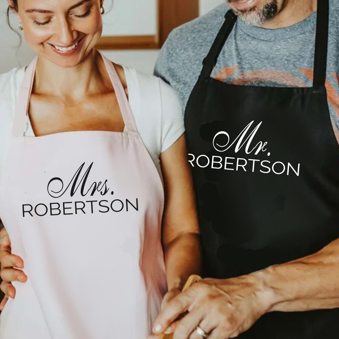 Personalised Couples Apron Set from Happy Look | South Africa – Elegant design featuring "Mr." and "Mrs." titles. Perfect for weddings, anniversaries, and celebrations, customisable with names. A thoughtful gift that brings joy and lasting memories. Shop now!