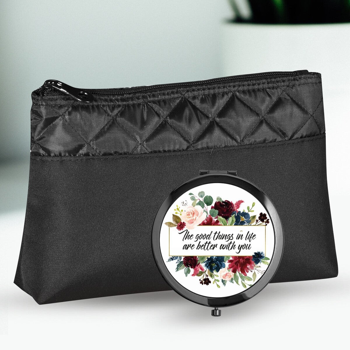Personalised Cosmetic Bag and Mirror Set from Happy Look | South Africa – Elegant black design featuring floral artwork with an uplifting quote. Perfect for everyday use and customizable with personal quotes. A thoughtful gift that brings joy and lasting memories. Shop now!