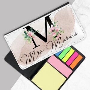 Personalised Floral Memopad Holder from Happy Look | South Africa – Elegant PU leather memo holder with custom text or name. Includes a memopad, pen, paperclips, and sticky notes. Perfect for teachers, professionals, and desk organisation. A thoughtful and stylish gift that adds a personal touch. Shop now!