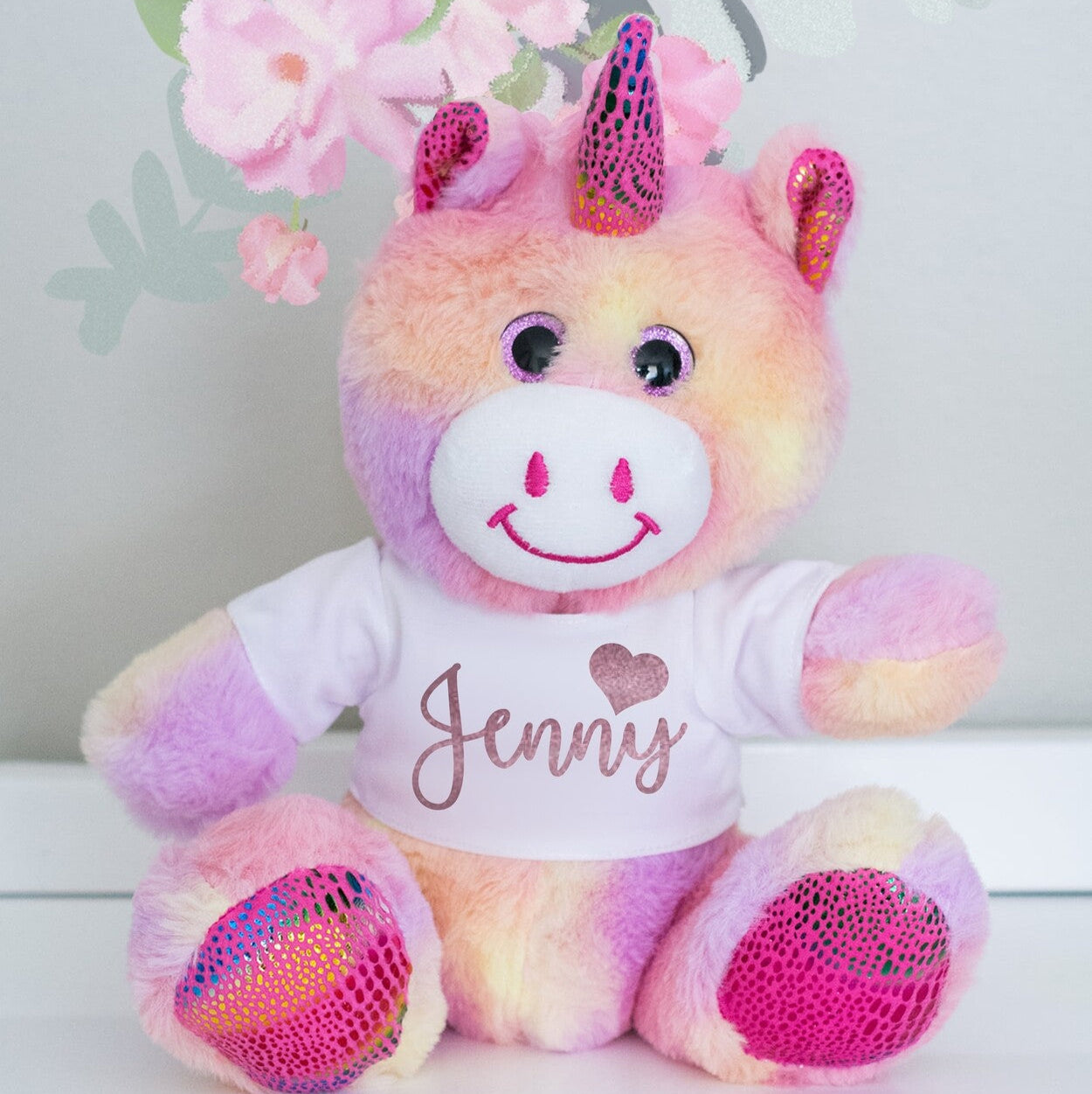 Personalised Unicorn Teddy from Happy Look | South Africa – Features a t-shirt with the name "Jenny".
Perfect for birthdays and personalized gifts and customisable with a choice of names. A thoughtful gift that brings joy and lasting memories. Shop now!