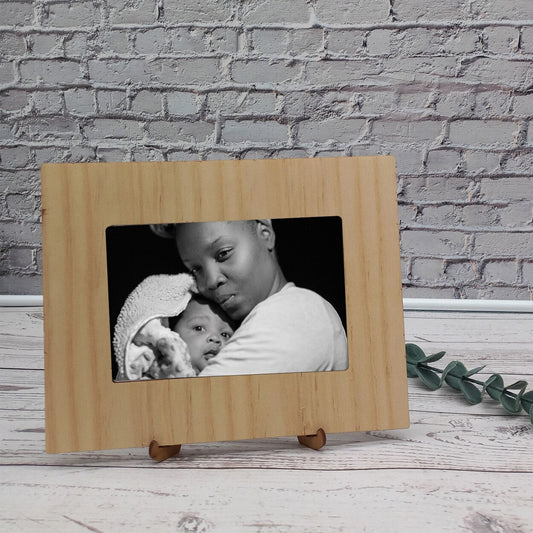 Personalised Wooden Photo Frame from Happy Look | South Africa – Simple and elegant design for capturing cherished moments. Perfect for new moms and customisable with family names. A thoughtful gift that brings joy and lasting memories. Shop now!