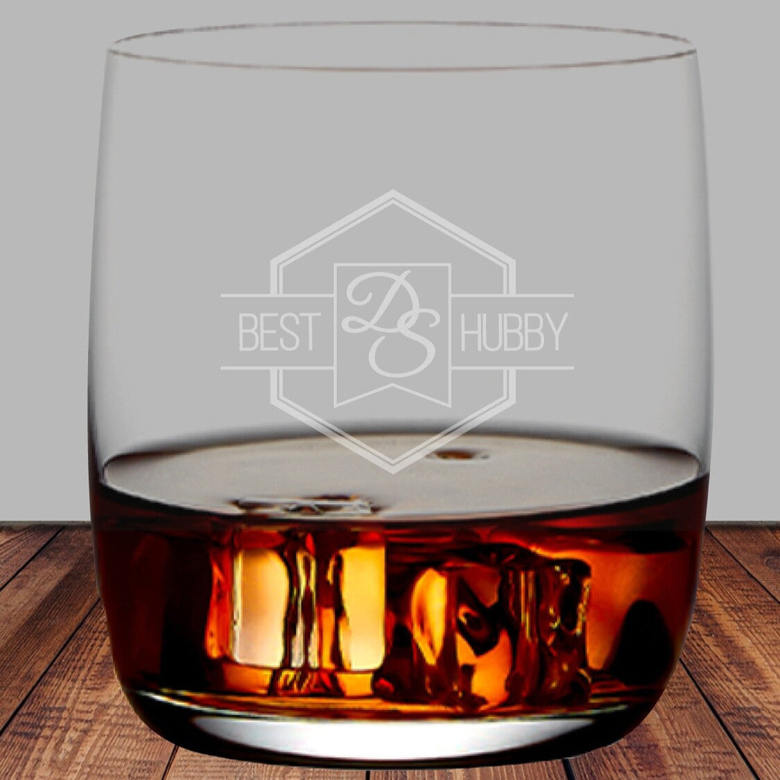 Personalised Engraved Whiskey Glass from Happy Look | South Africa – A stylish and durable glass, expertly engraved with a custom name or message, perfect for whiskey lovers. Perfect for birthdays, anniversaries, weddings, Father’s Day, housewarmings, and corporate gifting, and customisable with a name, initials, date, or special message. A thoughtful gift that brings joy and lasting memories. Shop now – A personalised glass with "Best Hubby" engraved.