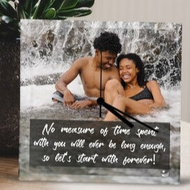 Personalised Square Glass Clock from Happy Look | South Africa – A beautiful photo clock featuring a joyful couple laughing together under a waterfall. The text reads, “No measure of time spent with you will ever be long enough, so let’s start with forever!” Customisable with your own photo, making it a perfect romantic gift for anniversaries, weddings, or special moments. A thoughtful gift that brings joy and lasting memories. Shop now!