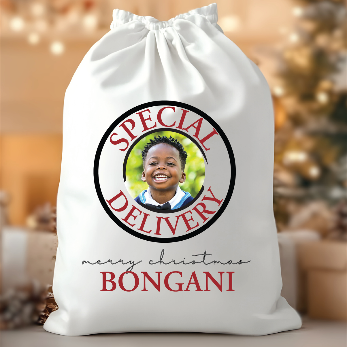 Personalised Santa Sack "SANTA CLAUS Please Deliver To Andile" from Happy Look | South Africa – A large white drawstring Christmas gift bag with a vintage design featuring "SANTA CLAUS" and the personalized text: "Please Deliver to Andile Who Is Officially On The Nice List."